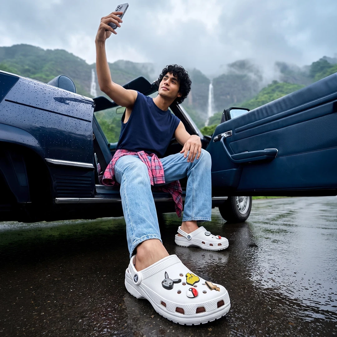 Man wearing white crocs